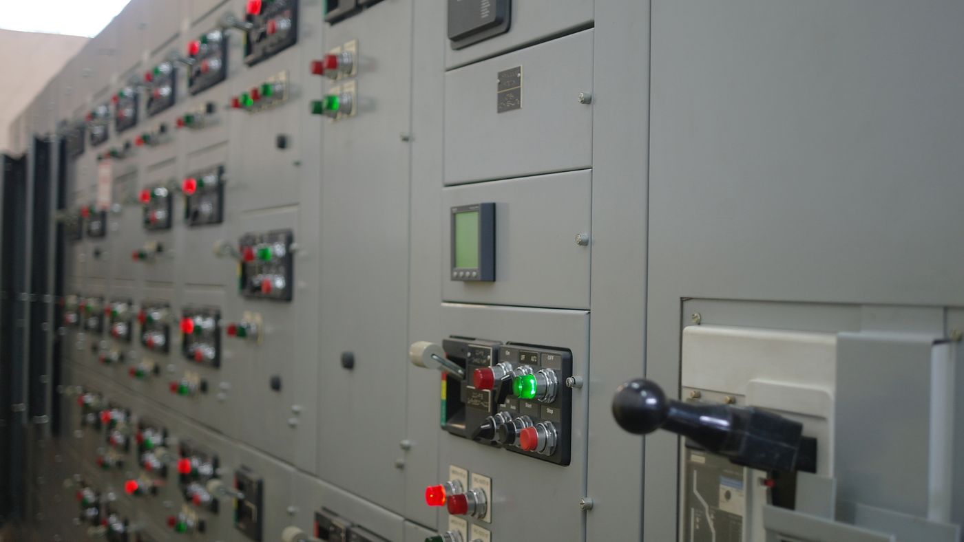 Low-voltage switchgear panel with indicator lamps and isolator